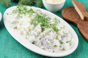 Śledzie w śmietanie (porcja 300g)